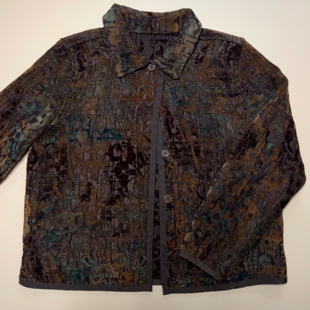 Brown and green light velvet reversible light weight jacket.
